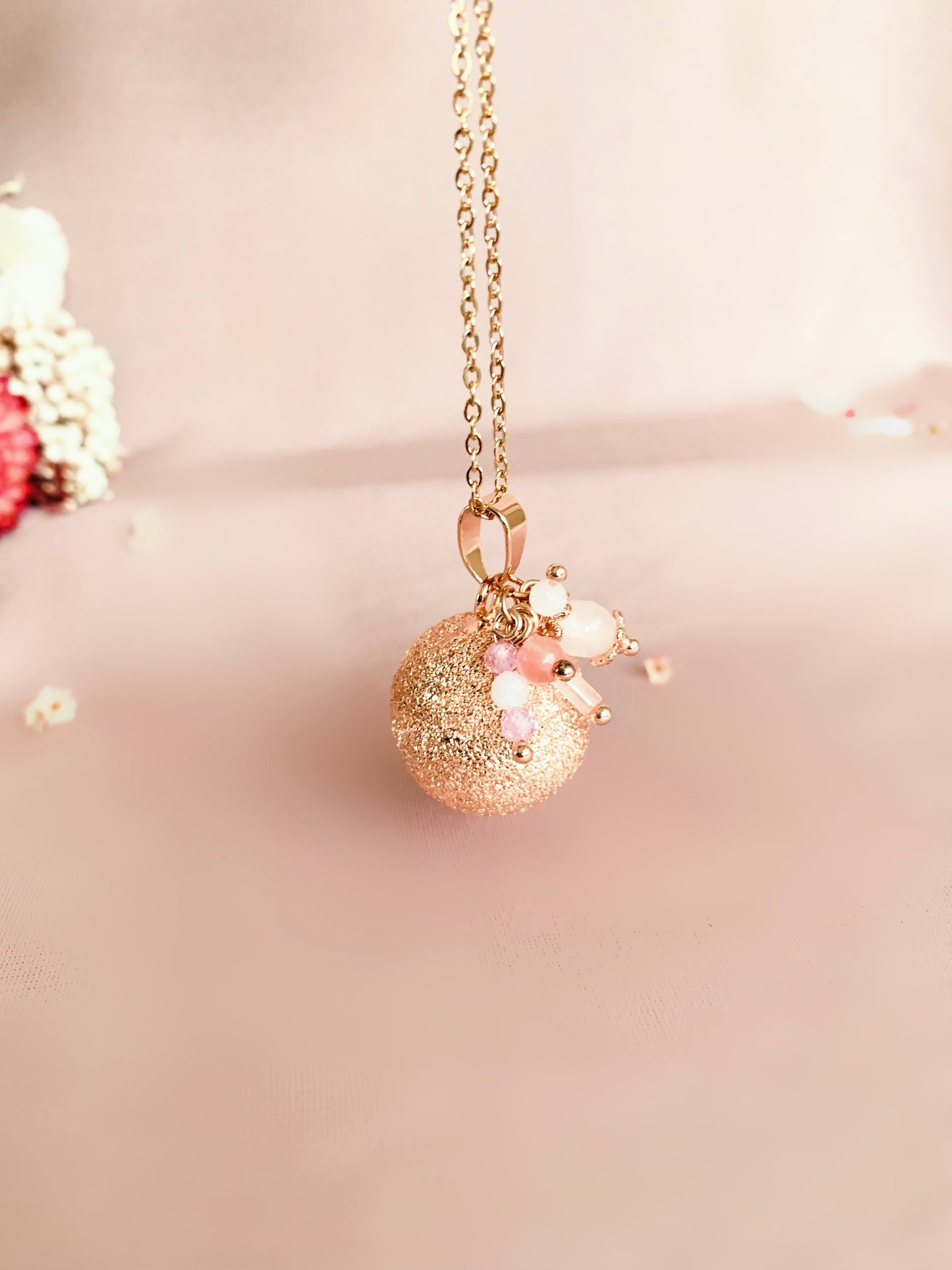 Bola de grossesse givrée or rose