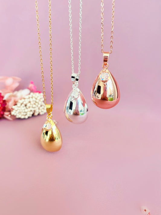bola de grossesse goutte d'eau et pendentif en cristal