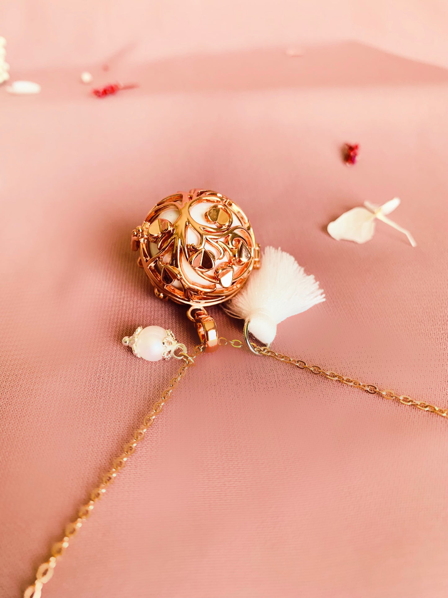 bola de grossesse or rose cage
