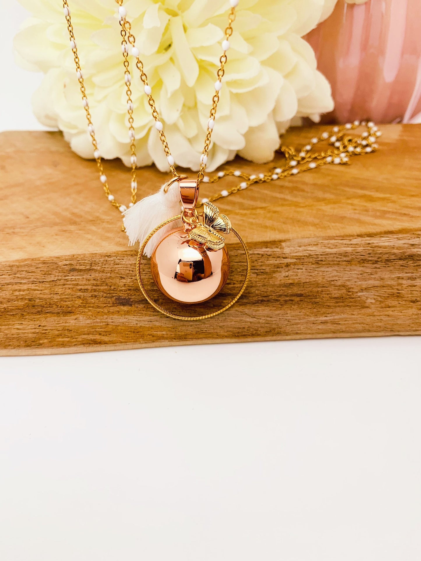 Bola de grossesse plaquée or rose et breloque papillon